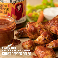 Mrs. Renfro's ghost pepper salsa close-up seeds and peppers showcasing intense heat