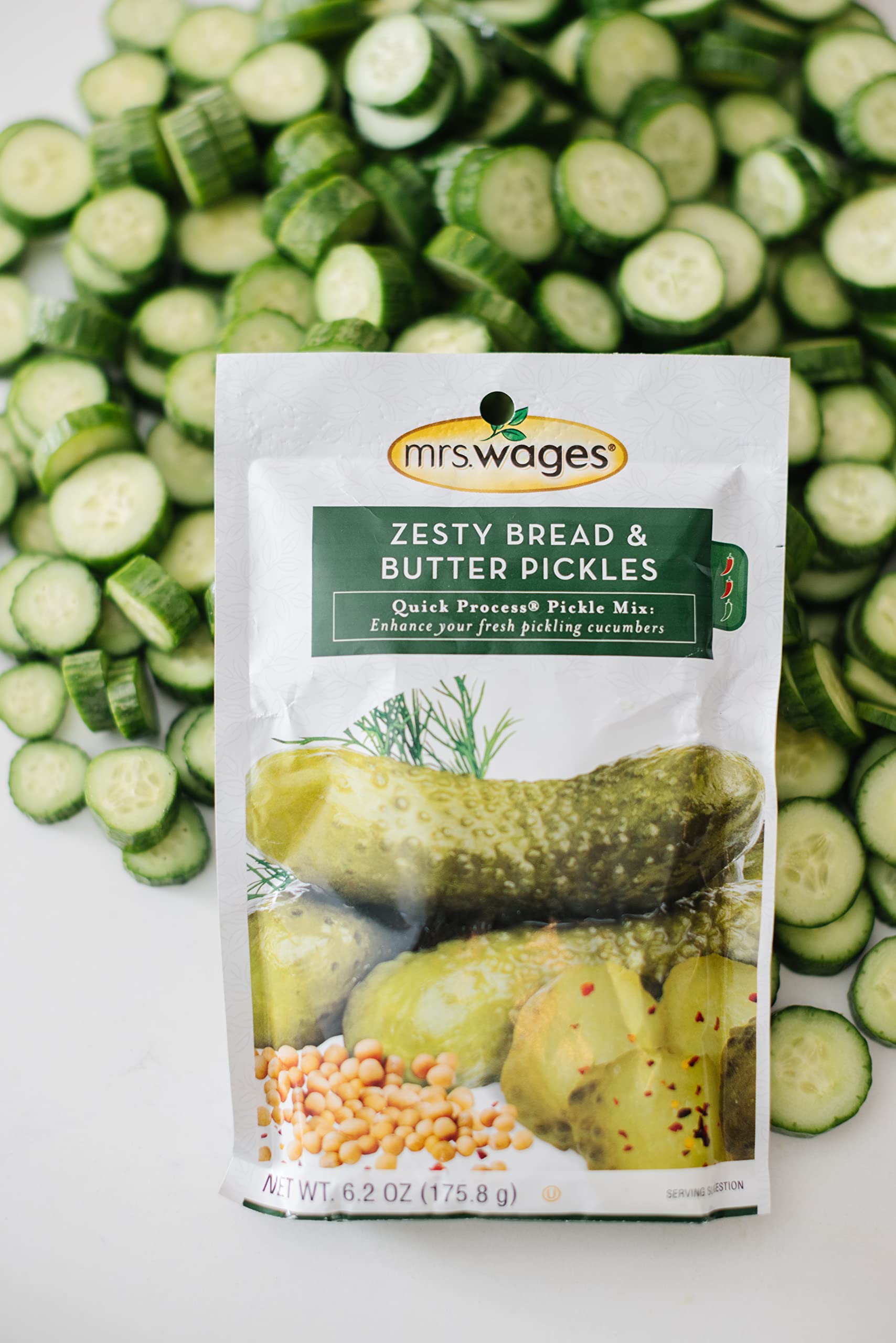 Mrs. Wages finished pickles in quart jar highlighting crisp texture and shelf-ready appearance