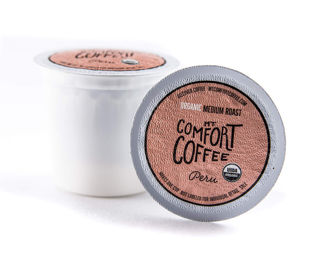 Mt. Comfort Coffee eighty pods scattered to show bulk convenience and value