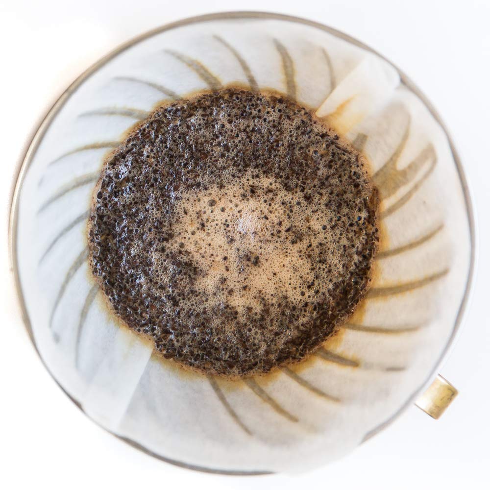 Mt. Comfort Coffee pod inserted in single-serve machine for easy brewing benefit