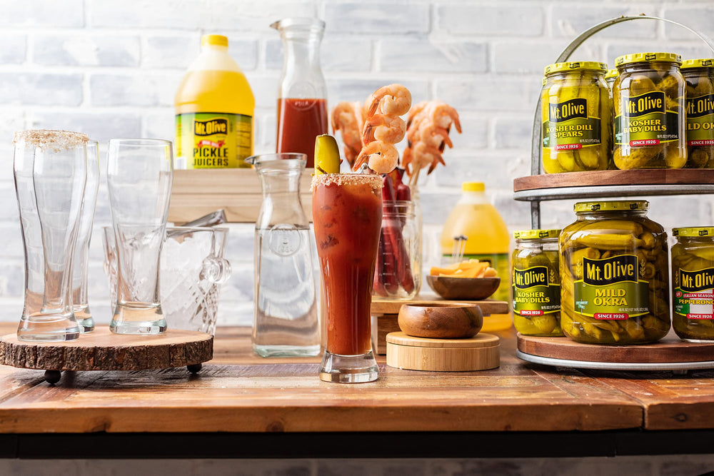Mt. Olive bottle next to common items to show scale and pantry-ready supply