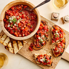 Muir Glen open can showing crushed tomatoes ready to cook with smoky flavor