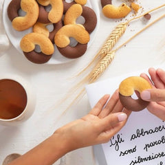 Mulino Bianco cookies served beside coffee showing pairing enjoyment benefit