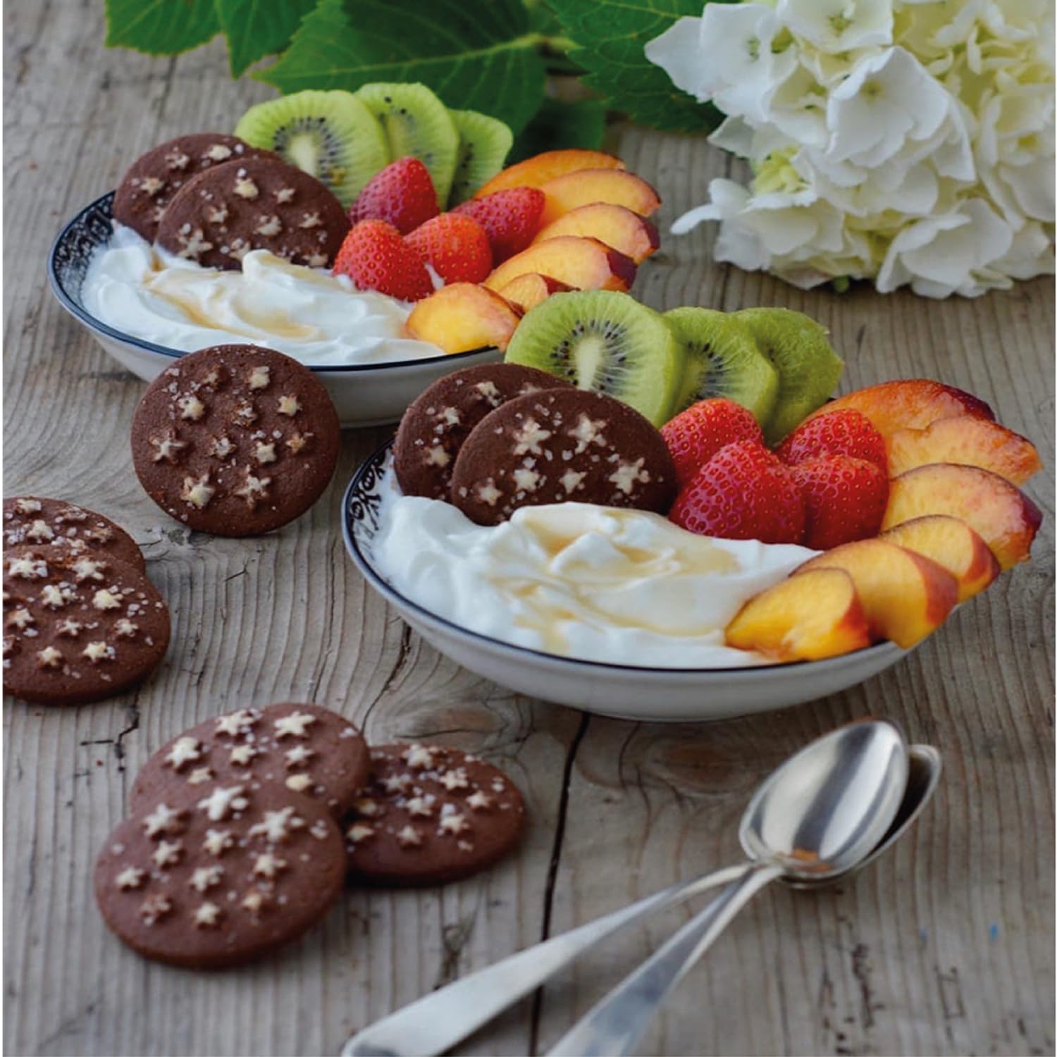 Mulino Bianco cookie dunked in milk emphasizing dunkability and softer center