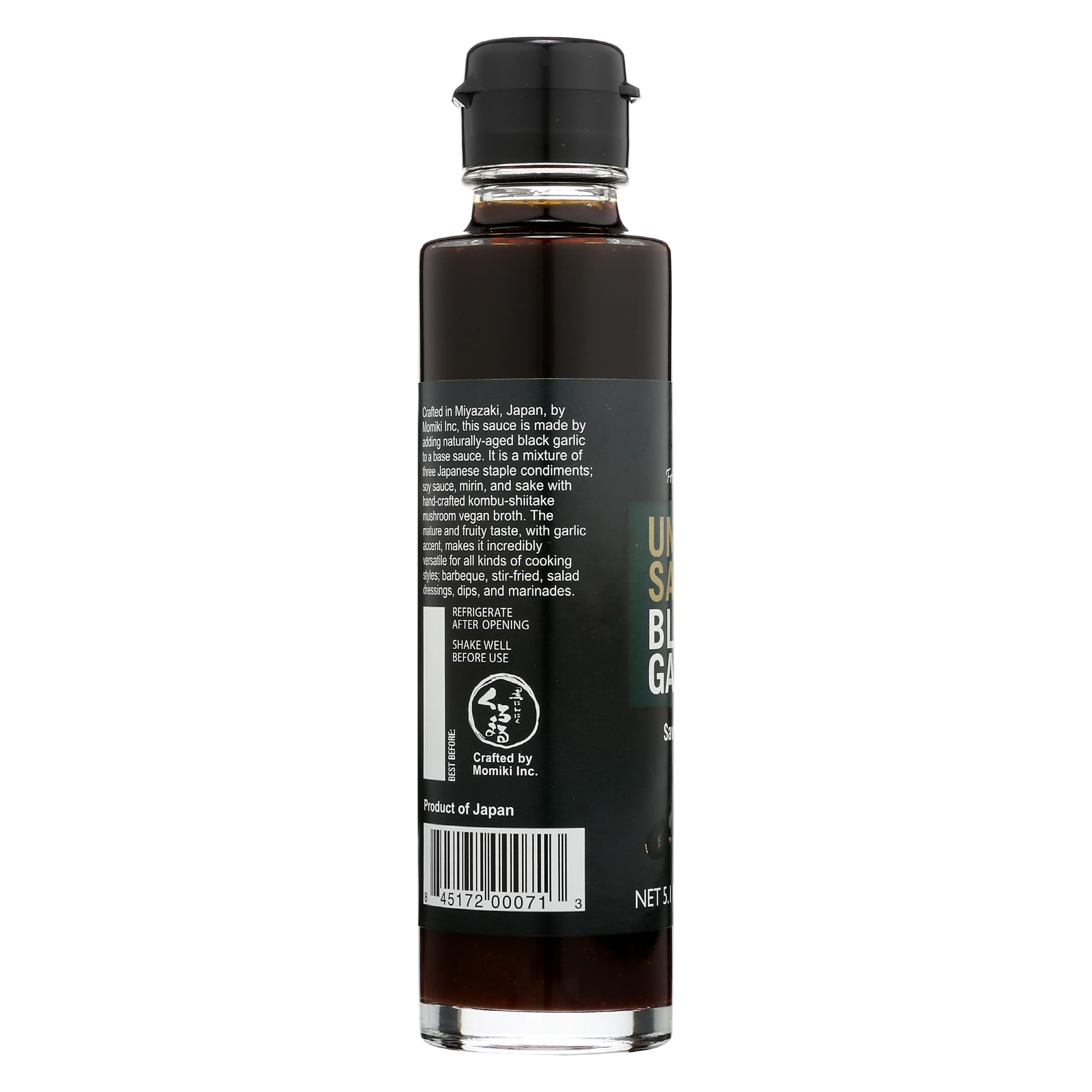 Muso From Japan bottle next to spoon to show 5.1 oz scale and portion control benefit
