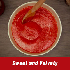 Mutti puree pouring into pan offering quick-cook convenience