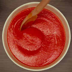 Mutti passata sauce on pasta illustrating rich color and flavor enhancement