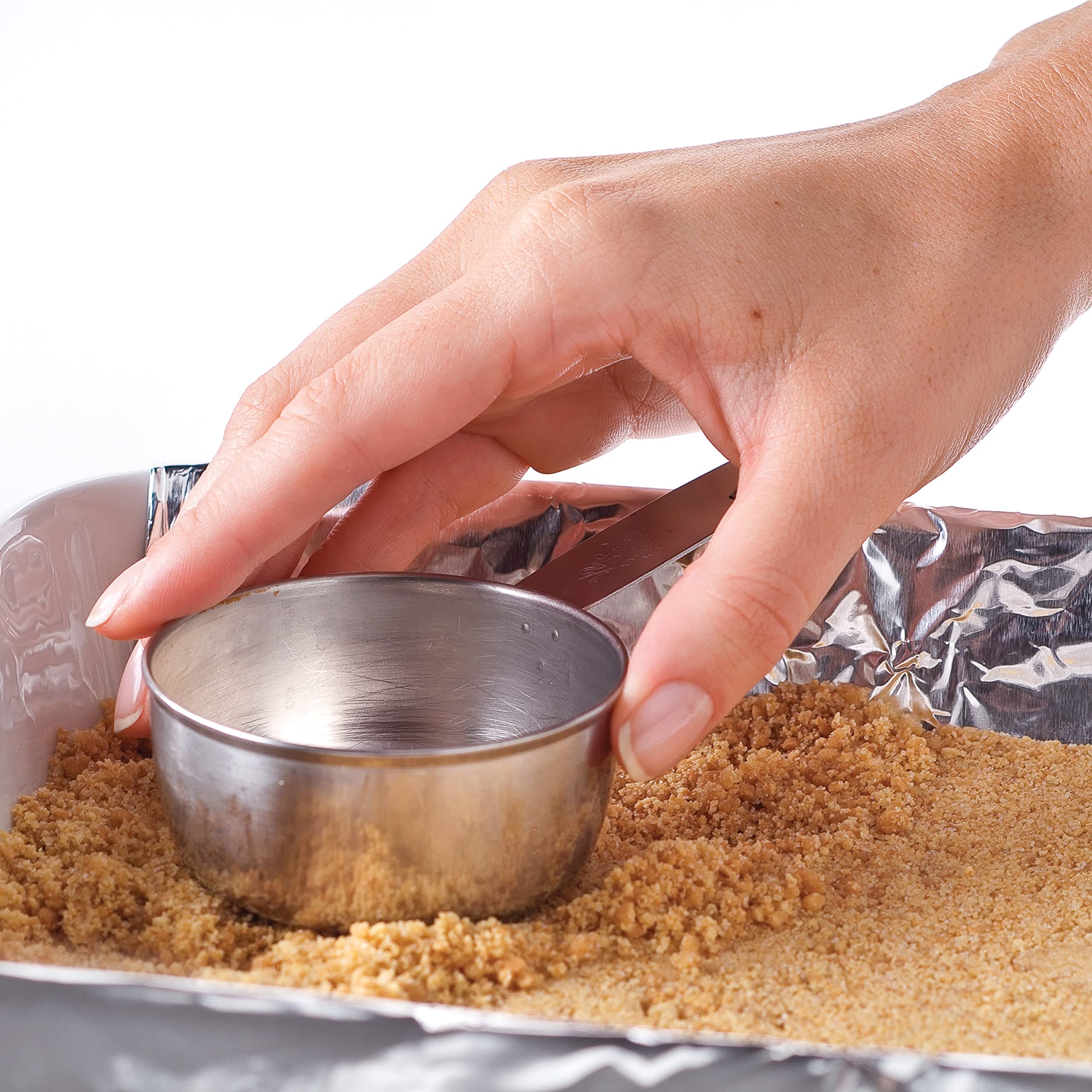 Slicing cheesecake with Nabisco crumb base, stable and clean release