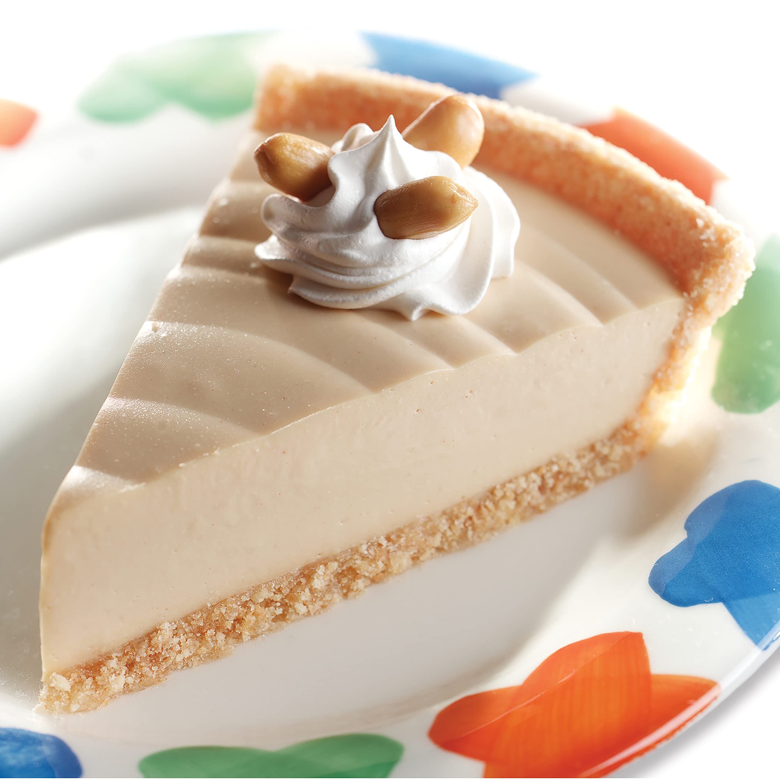 Pressing Nabisco crumbs into pie pan, forming a uniform crust