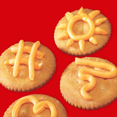 NABISCO RITZ cracker close-up with Easy Cheese applied for tasty pairing
