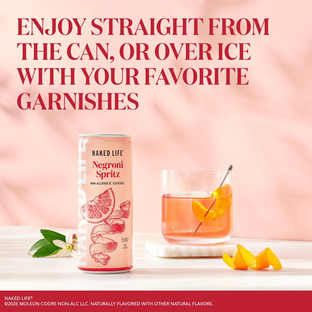 Naked Life can with orange peel garnish demonstrating enhanced citrus aroma