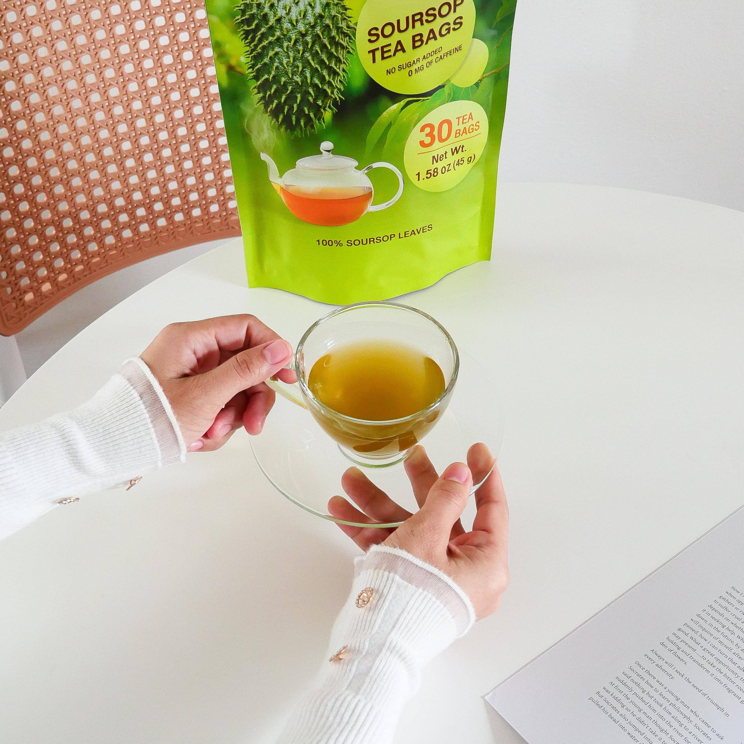 NalLife brewed cup of soursop tea demonstrating clear color and calming presentation