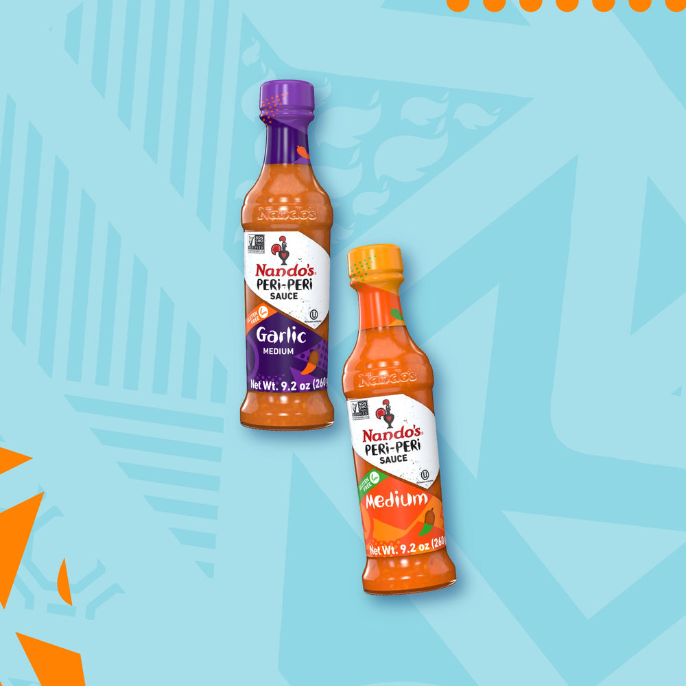 Nando's PERi-PERi medium sauce bottle close-up highlighting label and pour spout for precision