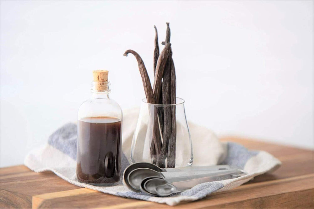 Native Vanilla next to measuring spoon showing accurate tablespoon substitution