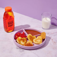 Nature Nate's close-up honey pour highlighting smooth texture and rich flavor