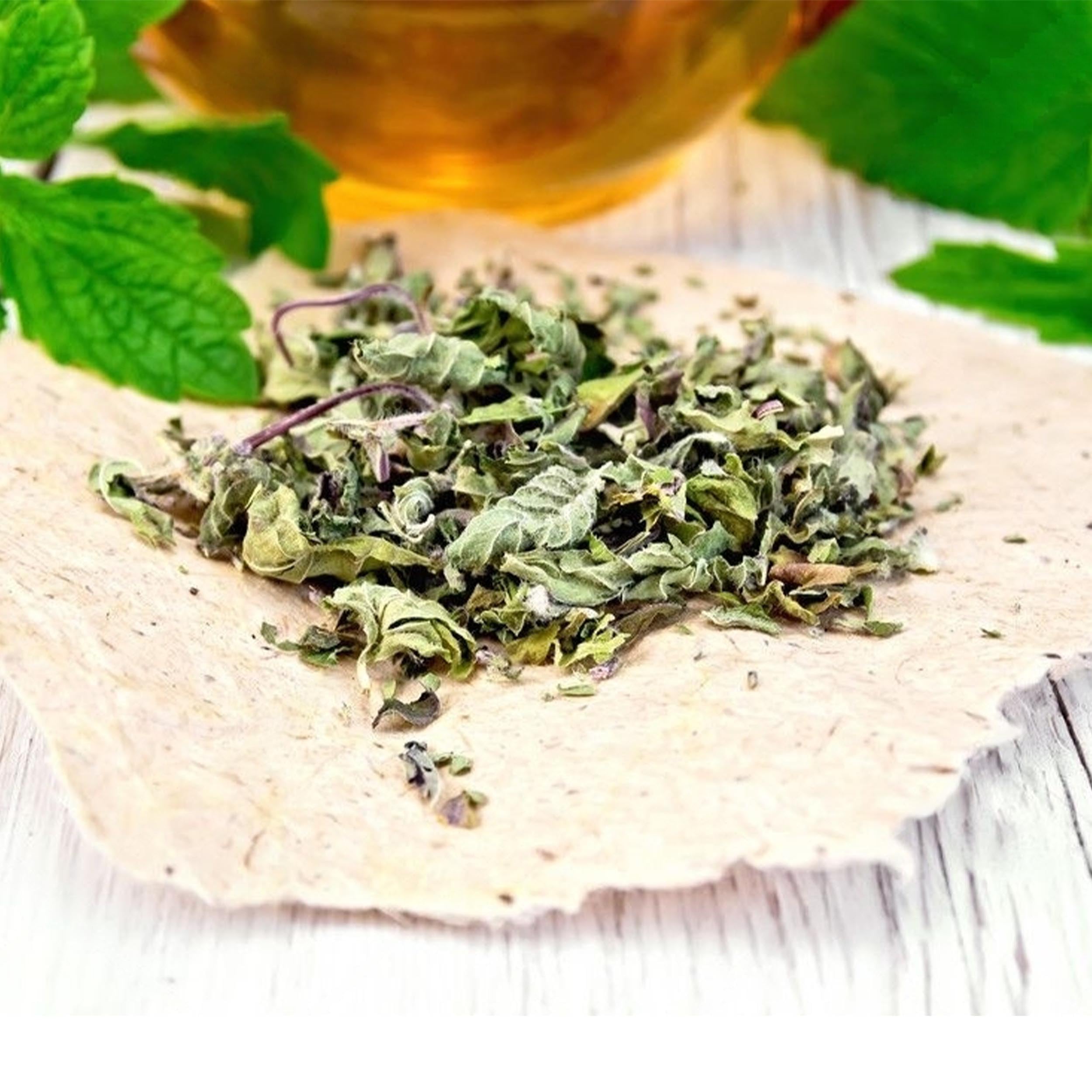 NatureJam crushed mint steeping in teacup to provide quick aromatic mint tea infusion