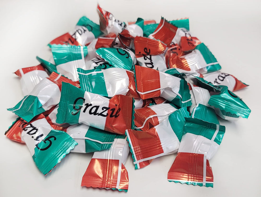 Naturejam candy jar display with Italian-flag wrappers creating festive table decor