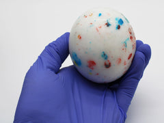 Naturejam jawbreaker in hand for scale, shows true size