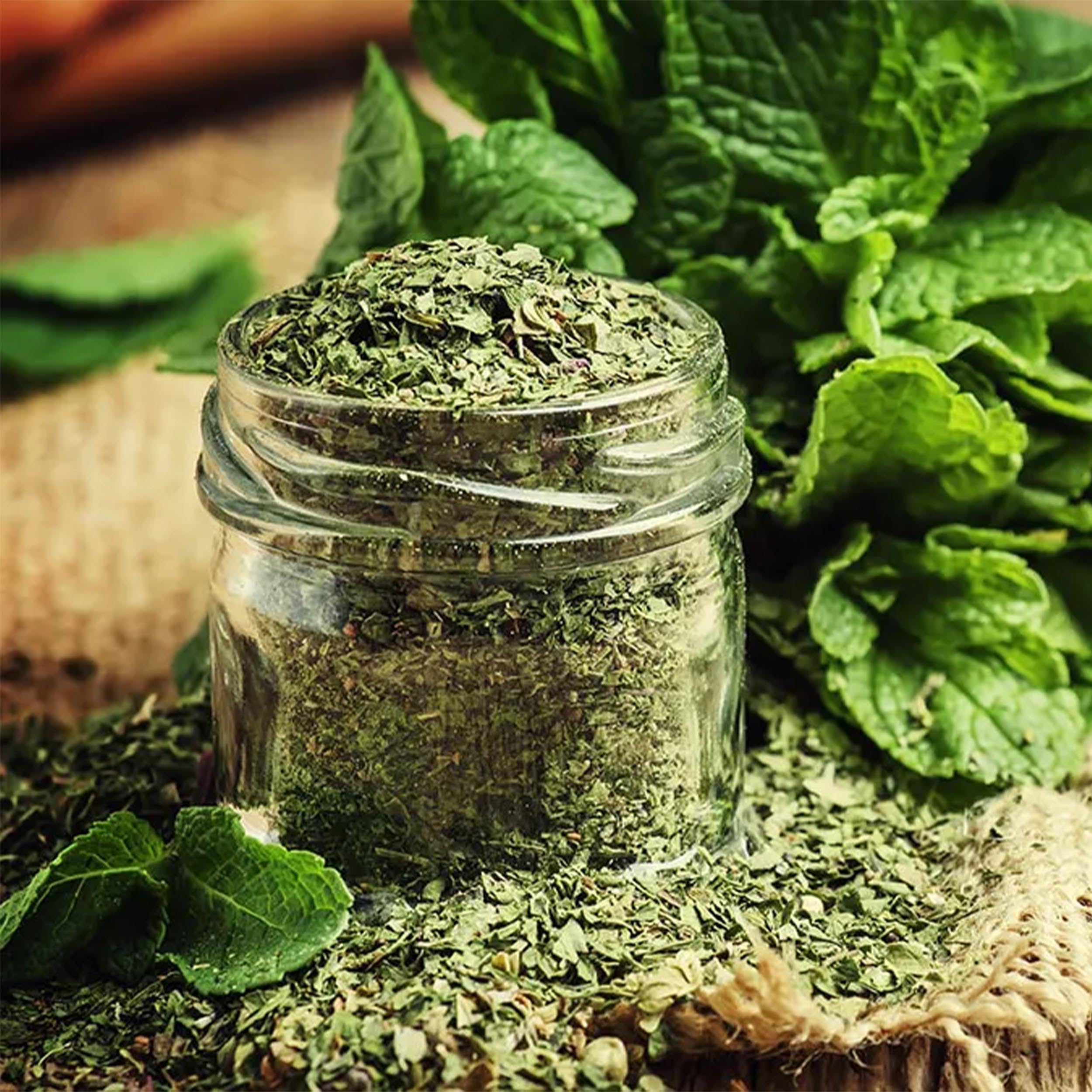 NatureJam crushed mint sprinkled on grilled meat as garnish adding bright fresh flavor