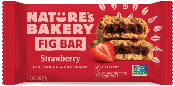 Nature's Bakery bar held in hand illustrating portable snack size