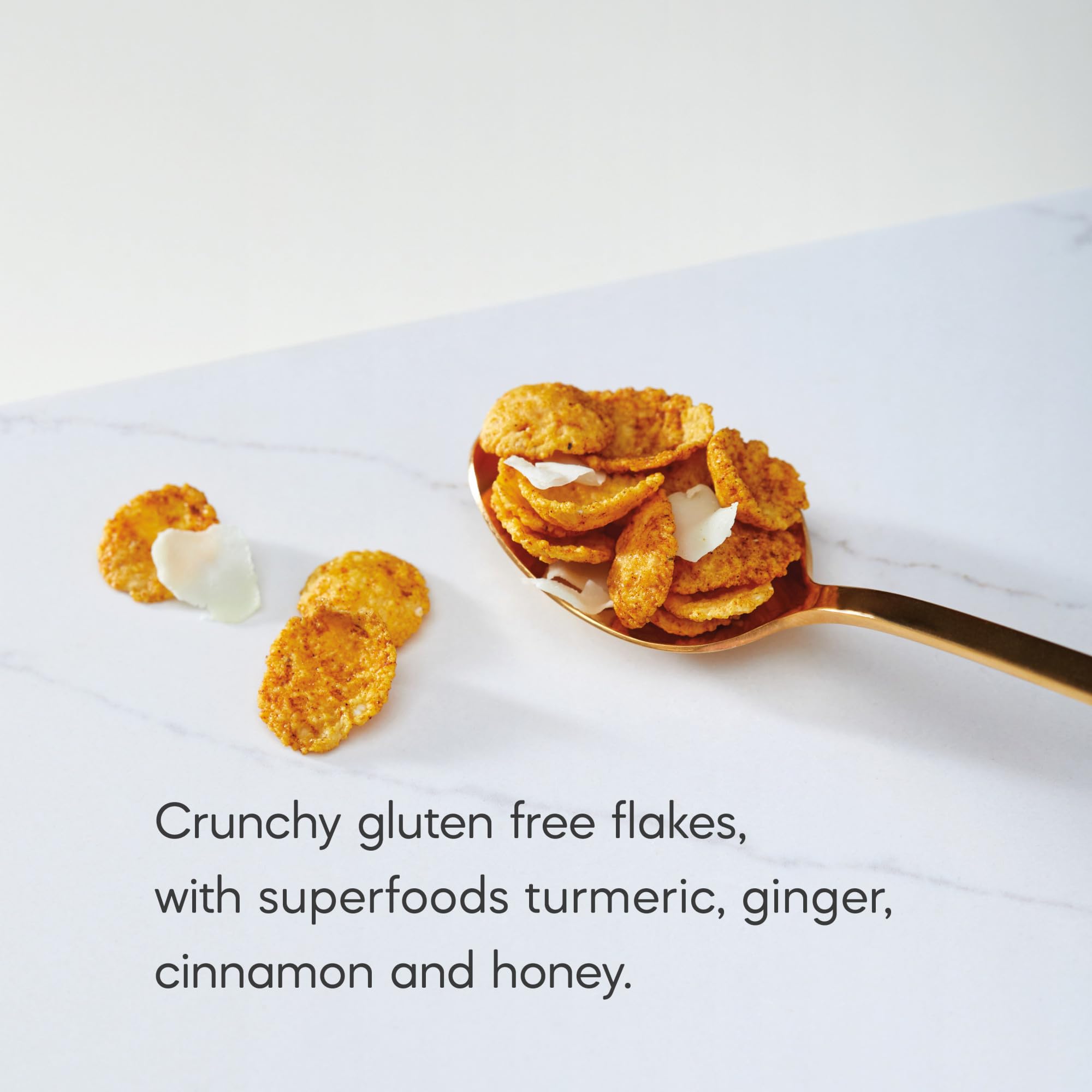 Nature's Path close-up of crunchy turmeric-coated flakes highlighting texture and color