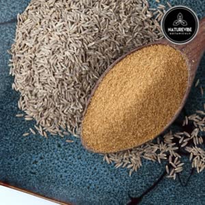 Naturevibe Botanicals cumin added to cooking pot showing flavor enhancement benefit