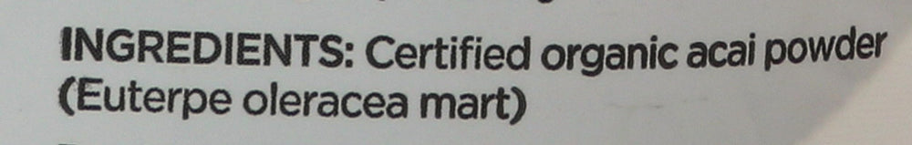 Navitas Organics powder on a spoon measuring a serving for convenience