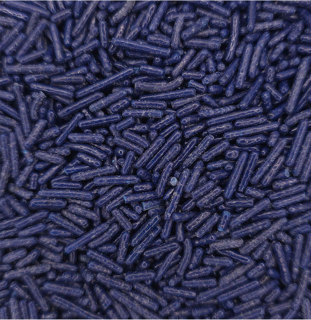 NCS jimmies on cupcake adding bold navy color and contrast