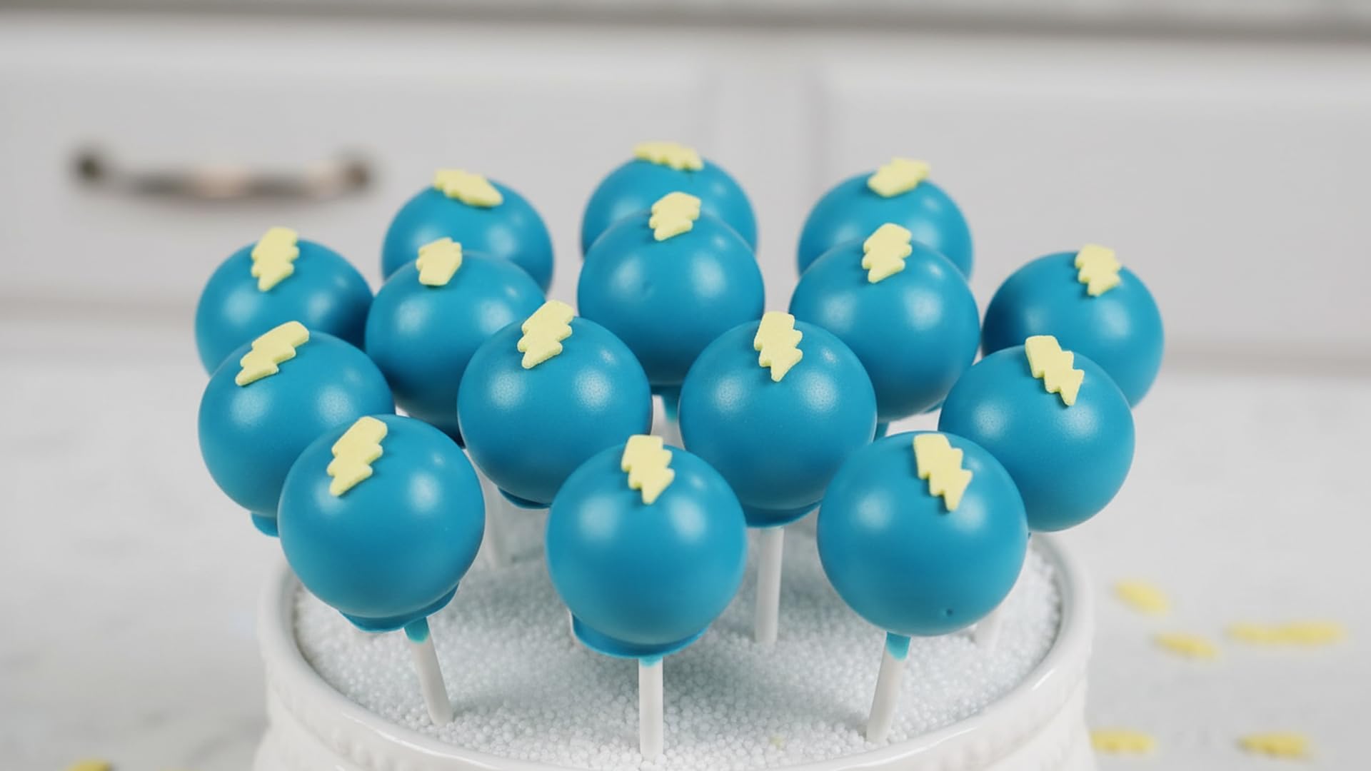 NCS sprinkles displayed in a baking studio with decorating tools