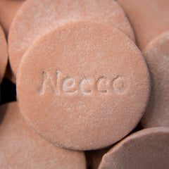 Necco roll beside a ruler showing scale and portion size for accurate serving expectations