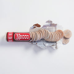 Detailed shot of Necco wafer edges highlighting chalky texture and richer cocoa flavor for taste clarity