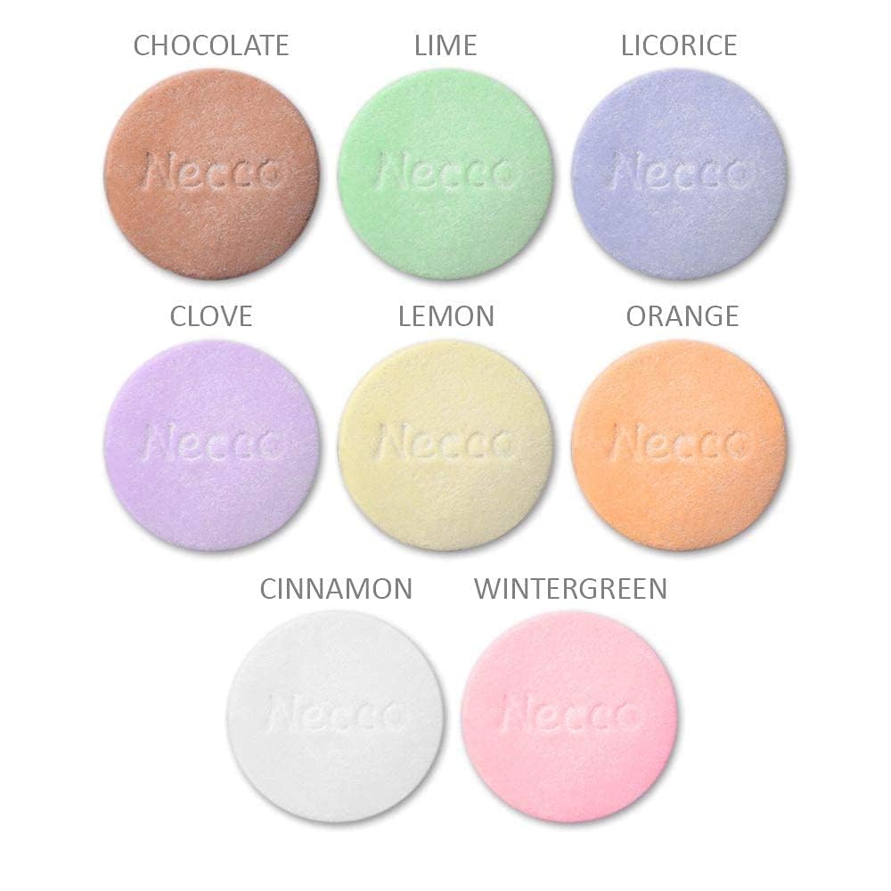 Necco wafers next to a soda can showing scale and portion size