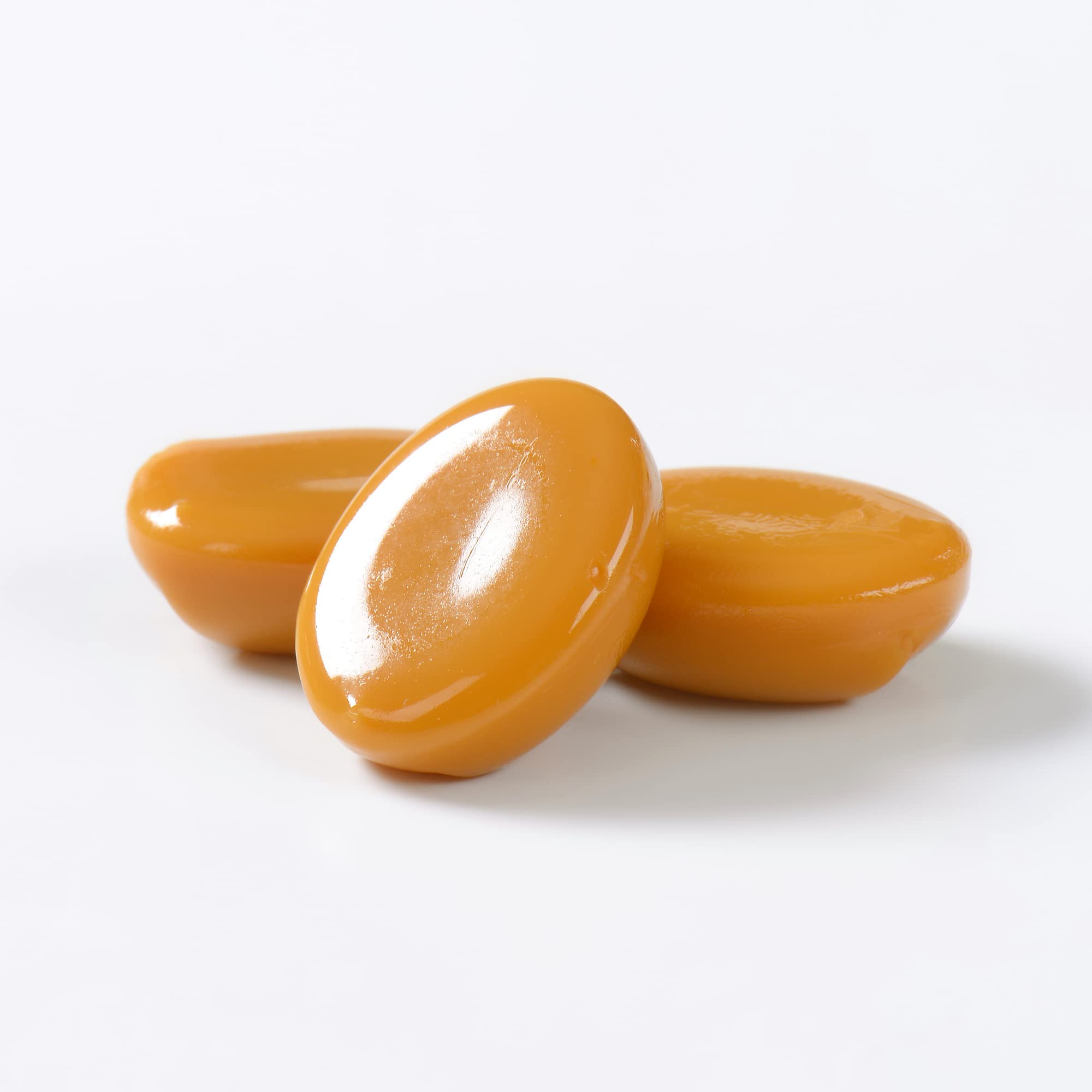 Needzo candy held in hand illustrating portion size and portability