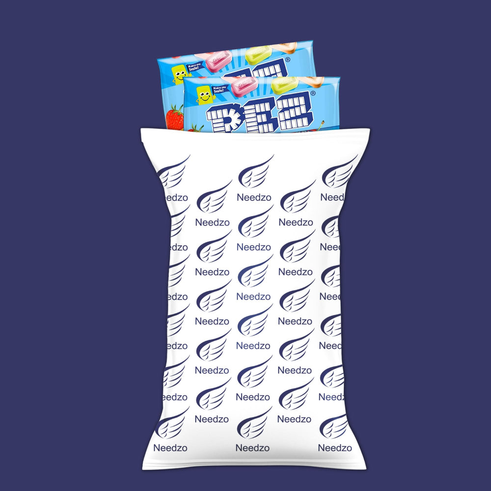 Needzo rolls next to a ruler illustrating size and portion clarity