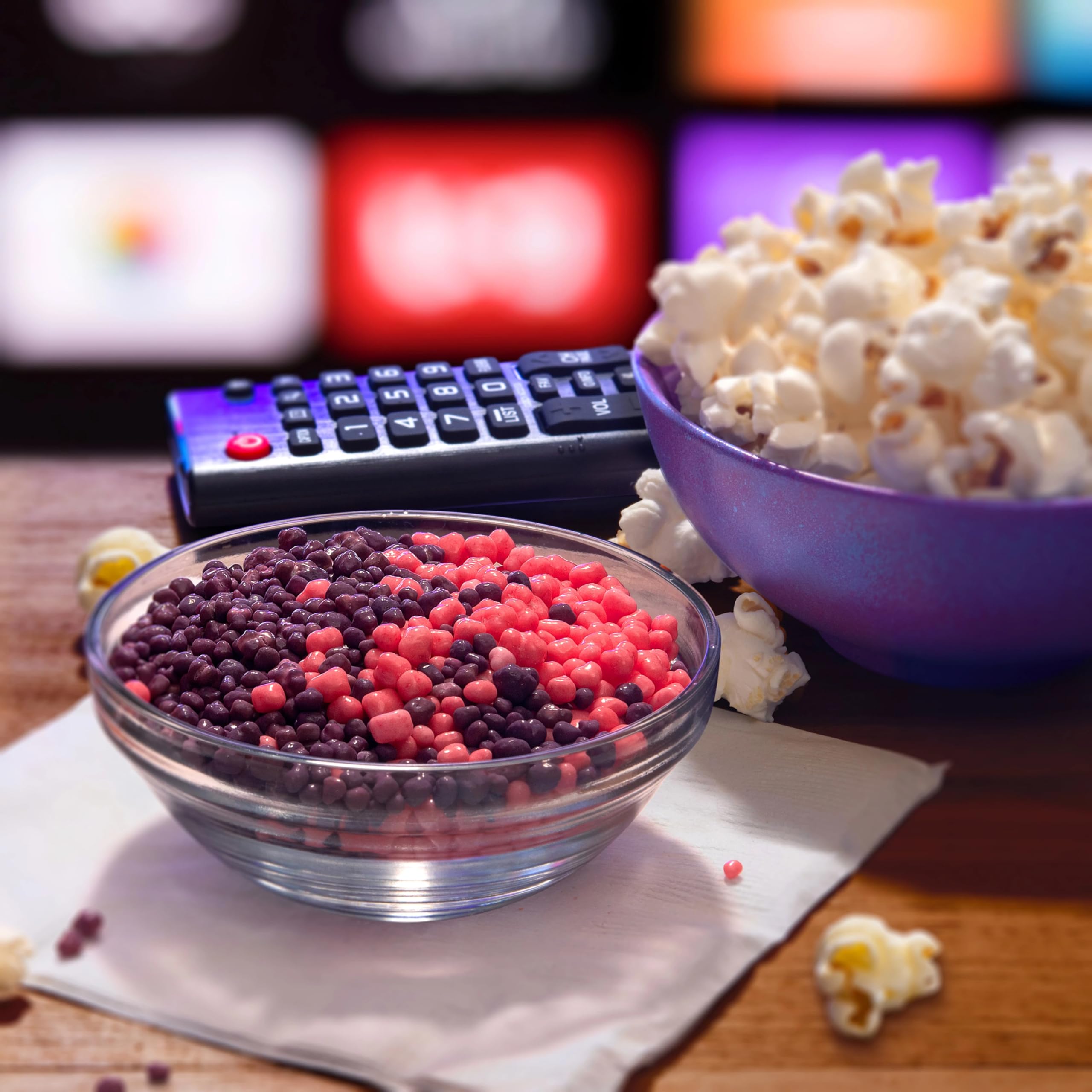Nerds theater box held in hand showing compact size and portability