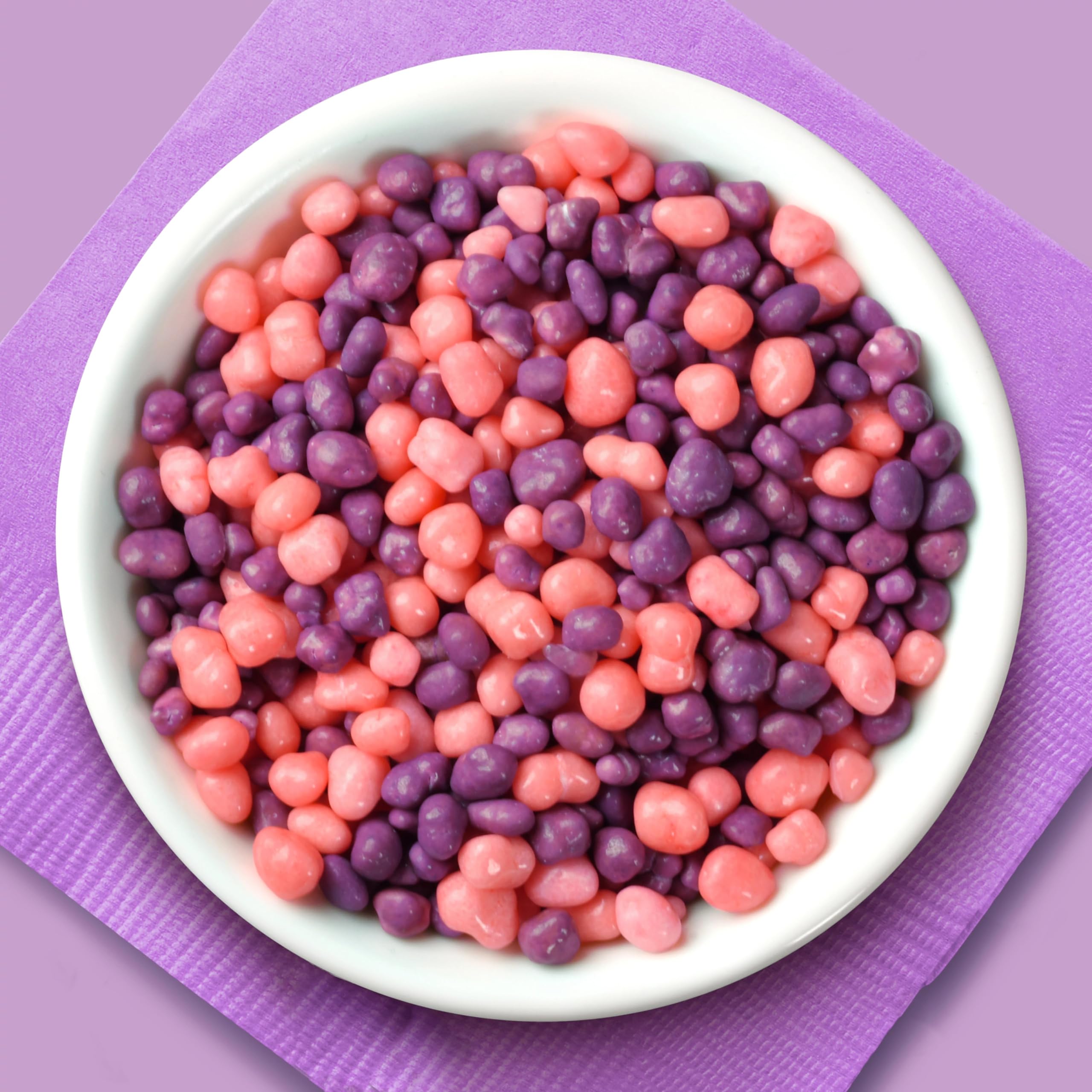 Nerds candy spilled to show crunchy texture and vibrant colors for appeal
