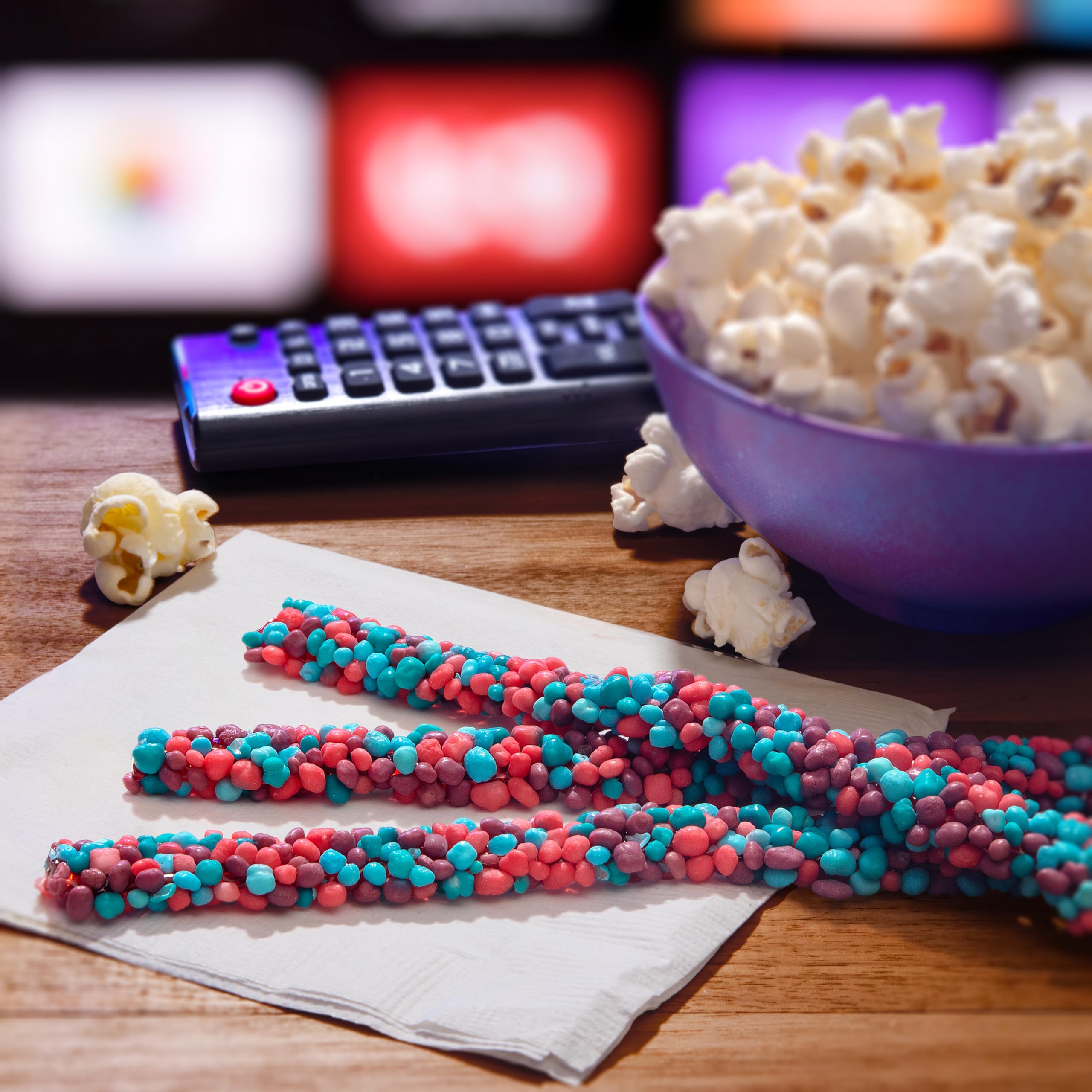 NERDS brand bowl of ropes at a party illustrating easy sharing and festive colors