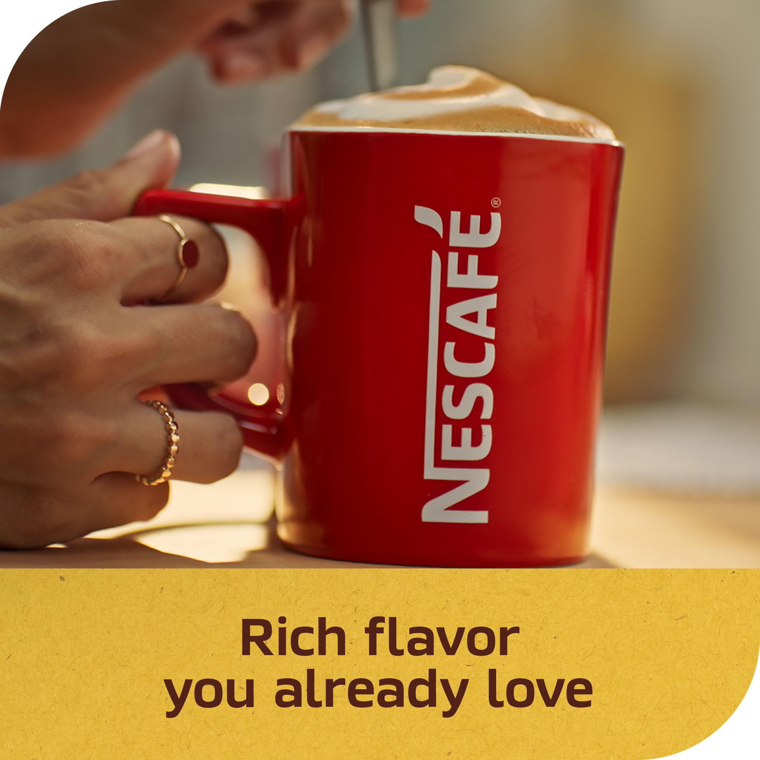Nescafé poured cup with cinnamon sprinkle showcasing warm flavored aroma