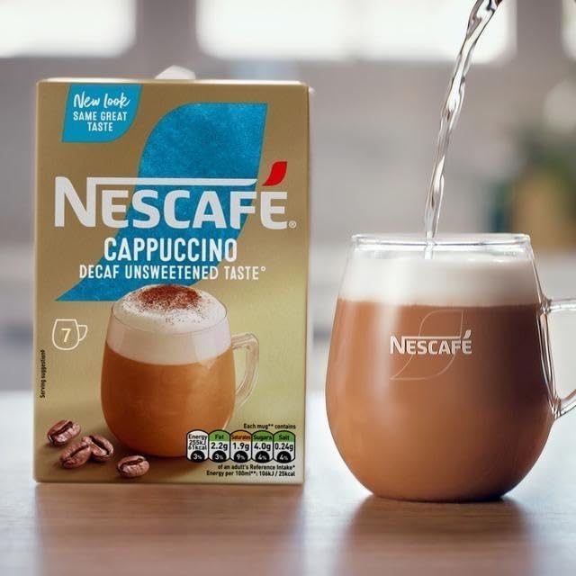 Nescafé powder texture shot showing fine instant mix ready to dissolve, fast preparation