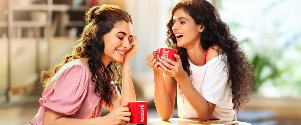 Nescafé cappuccino in office setting illustrating easy workplace coffee breaks