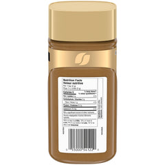 Nescafe Gold Espresso being poured into cup for quick preparation
