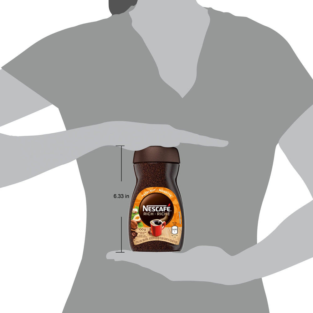 breakfast table with NESCAFÉ jar and cup illustrating easy morning convenience