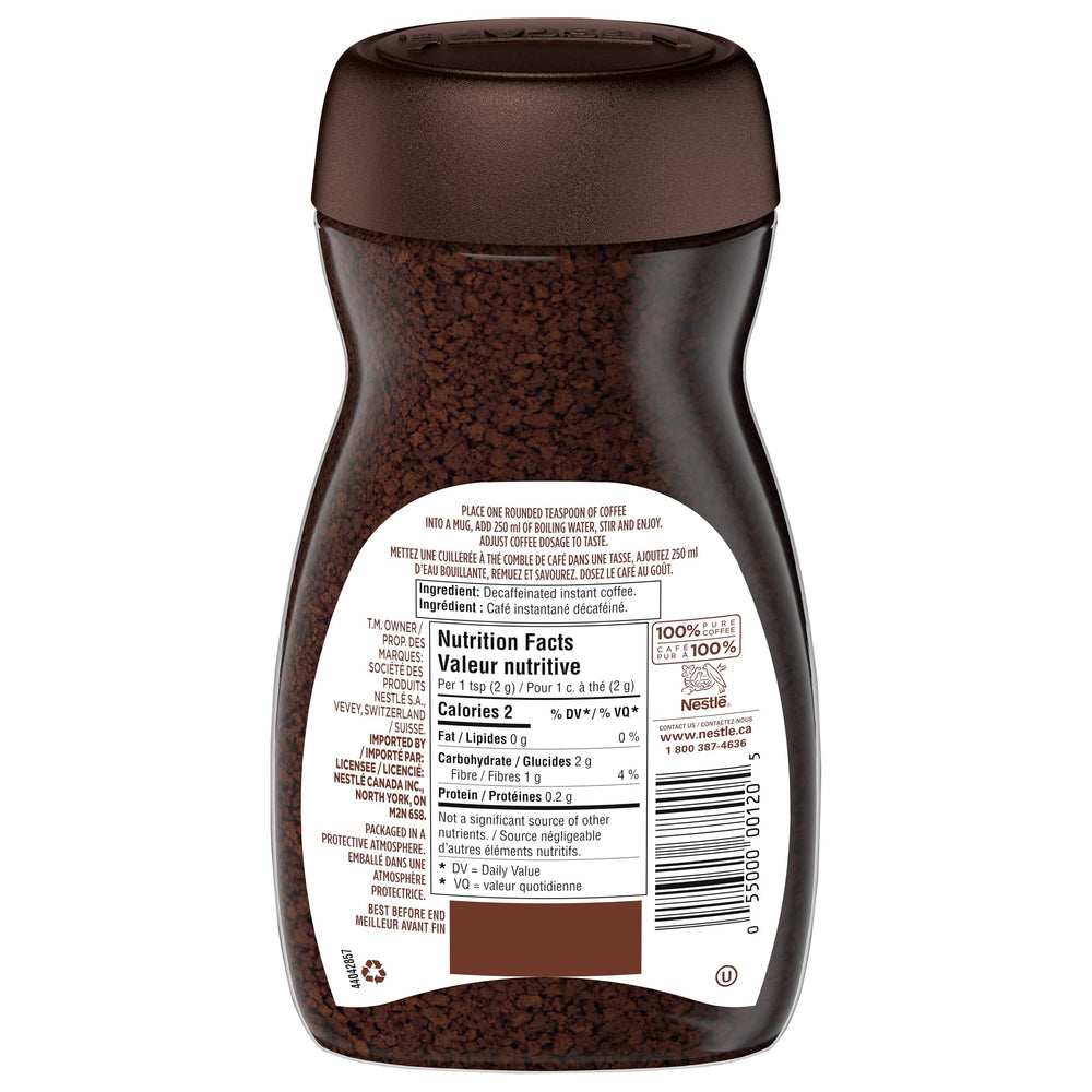 NESCAFÉ Rich decaffeinated being stirred into a cup, demonstrating quick preparation benefit