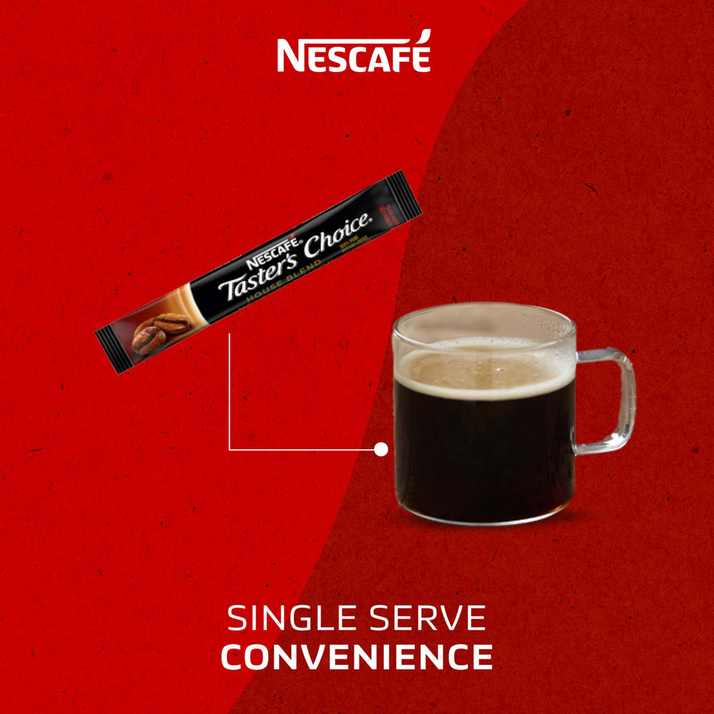 Nescafe packets in hand for scale emphasizing portable portioning
