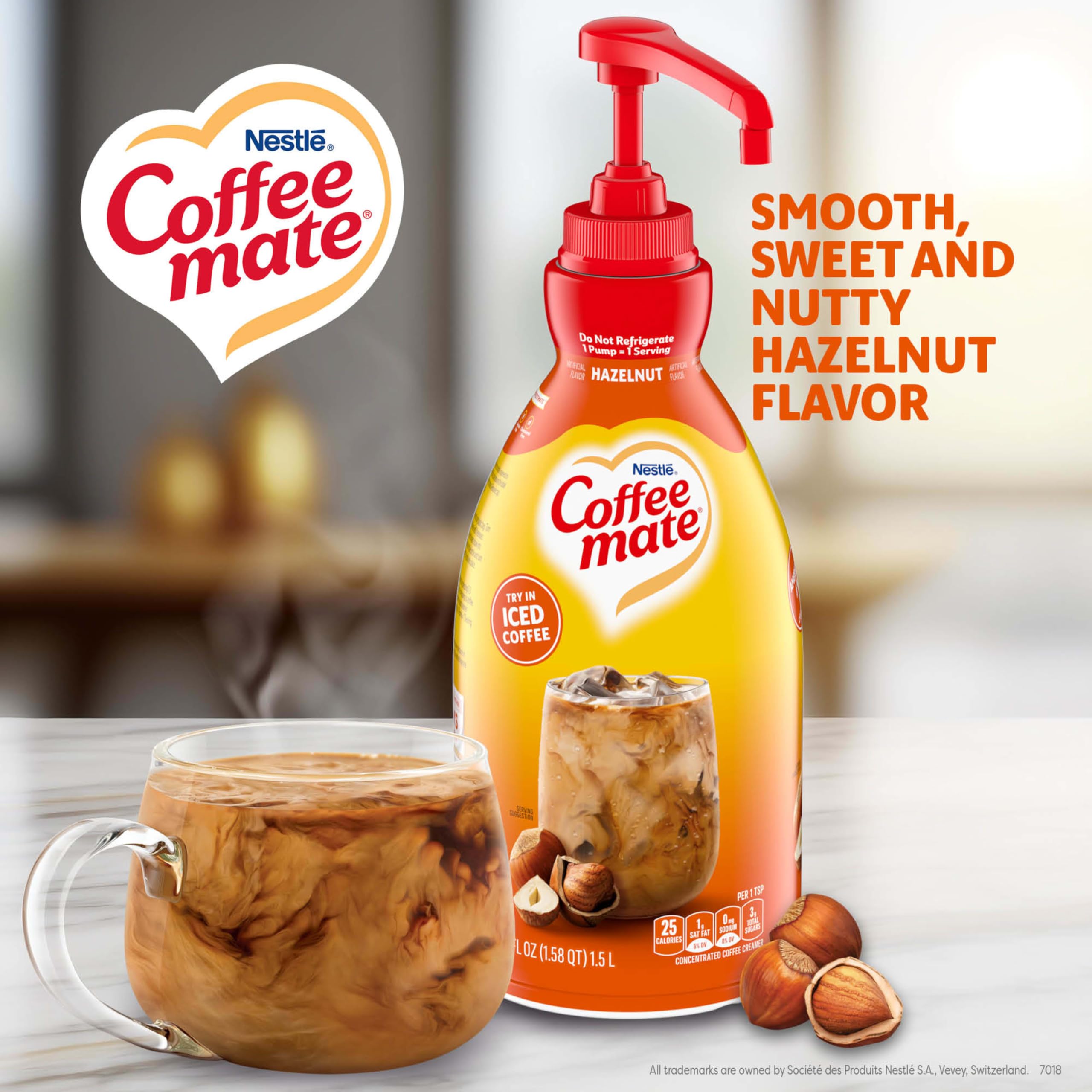 Nestle Coffee mate pump detail highlighting tamper-proof lock and clean dispense