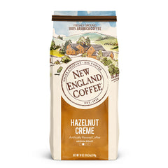 New England Coffee front bag showing hazelnut crème label and net weight, showcases flavor