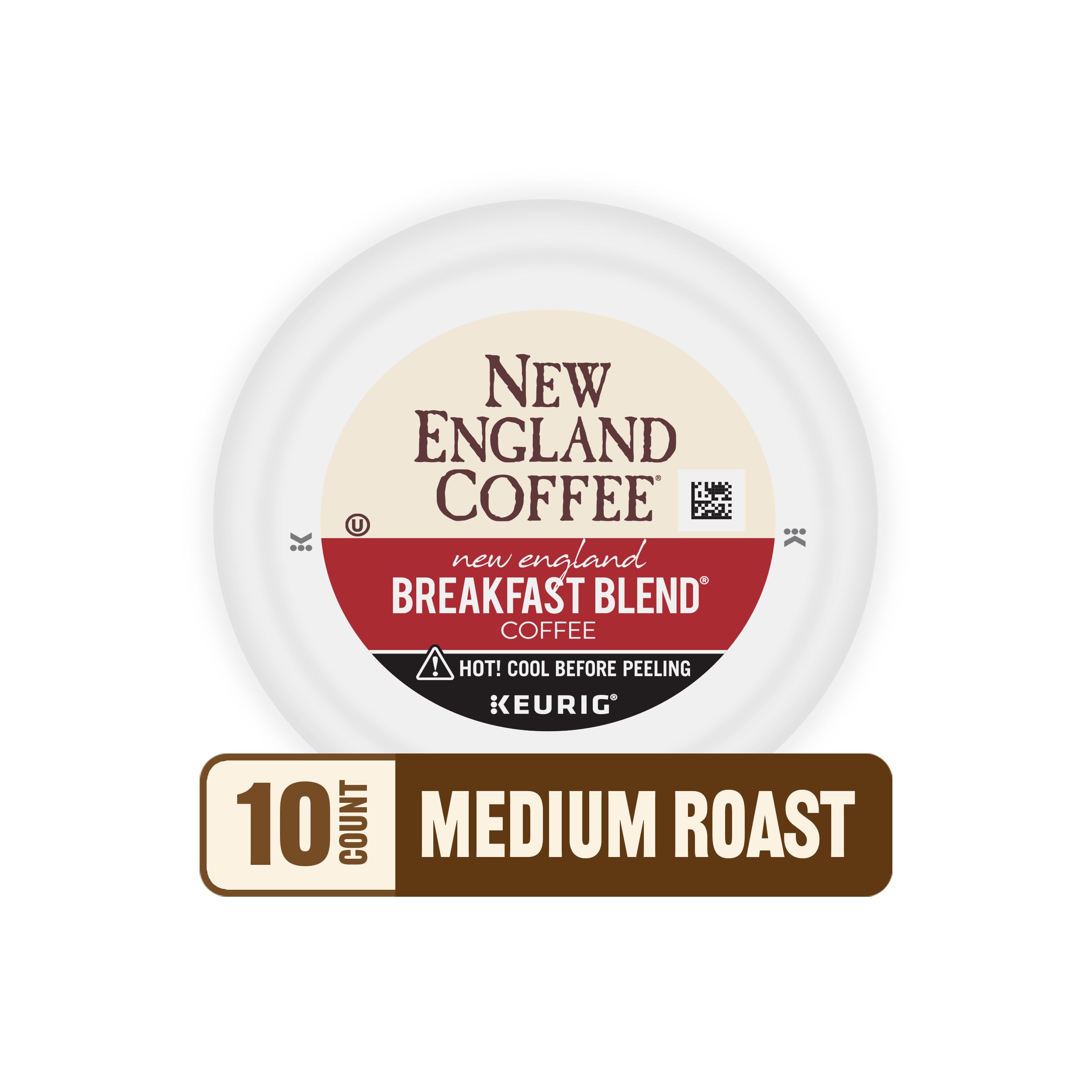 New England Coffee pod beside measuring spoon for scale and portion clarity