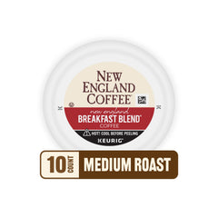 New England Coffee pod beside measuring spoon for scale and portion clarity