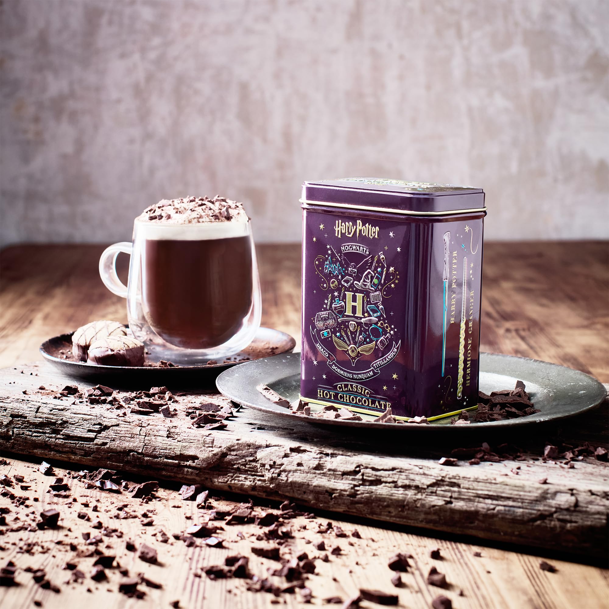 New English Teas tin side displaying Ron and Luna wand illustrations for collector interest