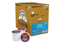Newman's Own K-Cup opened to show ground coffee texture and aroma-rich roast